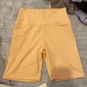 High waisted orange biker shorts